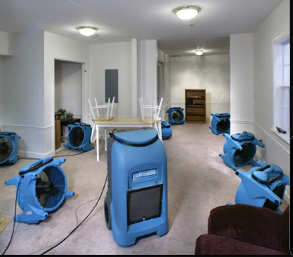 Air movers and dehumidifier setup for Water Damage Restoration in Greencastle